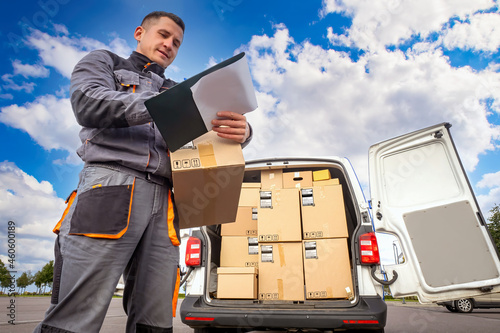 Delivery man at work. Couri...