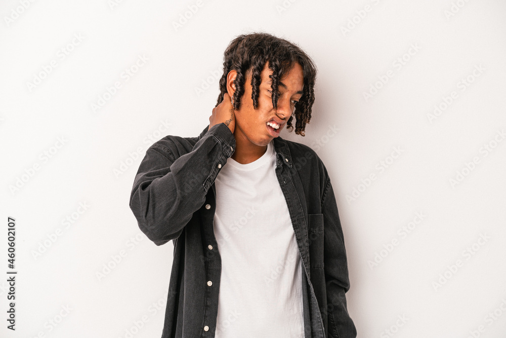 Young african american man isolated on white background suffering neck pain due to sedentary lifestyle. Young african american man isolated on white background suffering neck pain due to sedentary lifestyle.