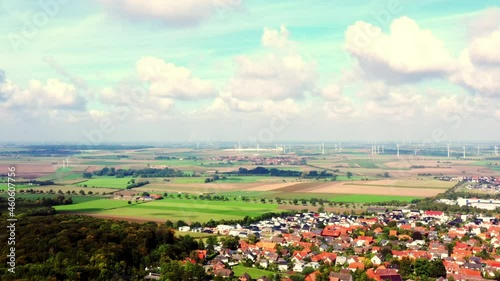 Lowland near Salzgitter, Germany, with the suburb Lichtenberg, fields, meadows and wind turbines in the background, aerial view photo