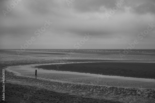 Stormy weather at Titchwell beach, North Norfolk photo