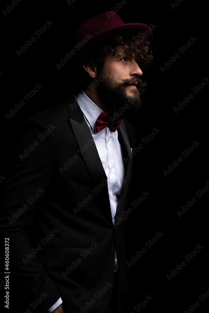 side view of a young businessman looking away side view of a young businessman looking away