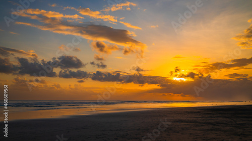 Sunset time. Seascape background. Cloudy sky. Scenic view. Sunset golden hour. Sunlight reflection in water. Magnificent scenery. Beautiful nature. Copy space. Kelanting beach, Bali