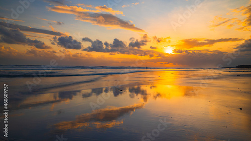 Sunset time. Seascape background. Bright sunlight. Sun at horizon line. Scenic view. Sunset golden hour. Sunlight reflection in water. Magnificent scenery. Copy space. Kelanting beach  Bali