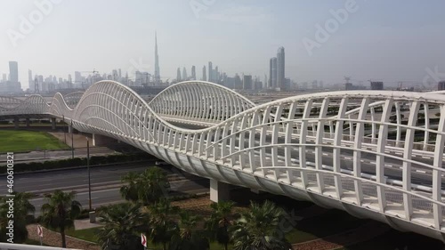 maydan bridge in the middle of dubai uae photo