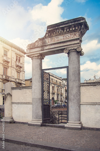 Ancient Roman Amphitheater (Anfiteatro Romano) and Church San Biagio in Piazza Stesicoro in Catania, Sicily photo