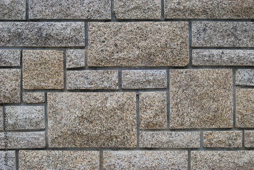 Textura de parede em pedras com cortes a direito em formas de quadrados e retângulos, pedaços de pedras encaixados, labirinto photo