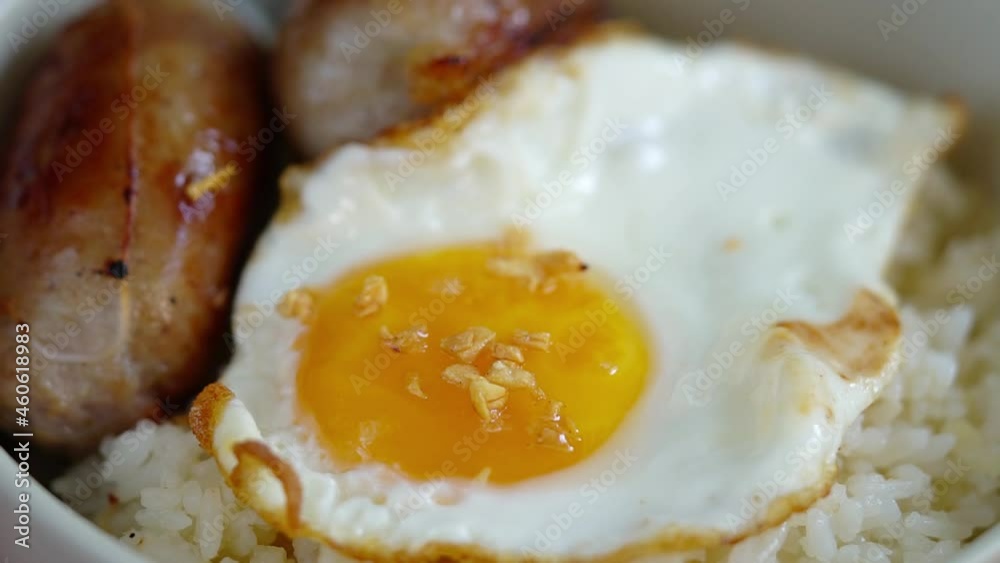 longgasilog, Filipino style hotdog with egg on top of garlic rice is one of favorite dishes of Filipinos longgasilog, Filipino style hotdog with egg on top of garlic rice is one of favorite dishes of Filipinos