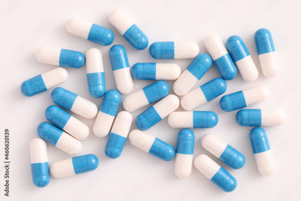 pills capsules close up on top view isolated in white background