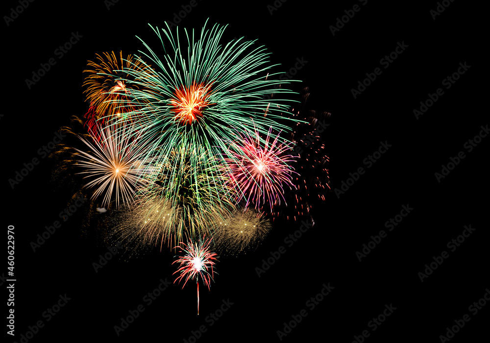 New Year celebration fireworks exploding in the sky.