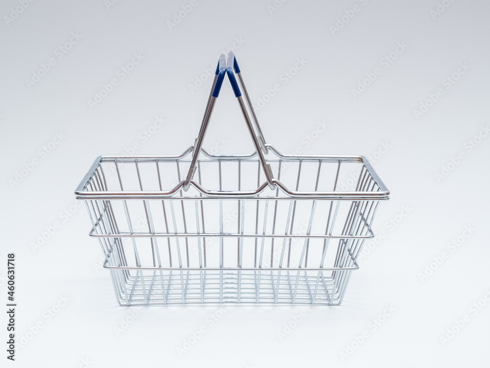 Empty Metal Shopping Basket on White Background Empty Metal Shopping Basket on White Background