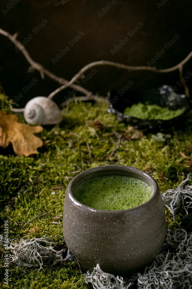 Fototapeta premium Traditional hot green tea matcha in ceramic cup