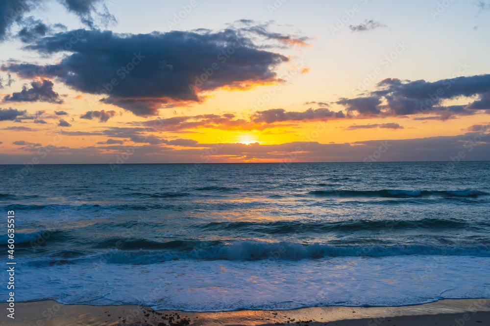 Spectacular sunrise view from ocean shore in Melbourne Beach, Florida