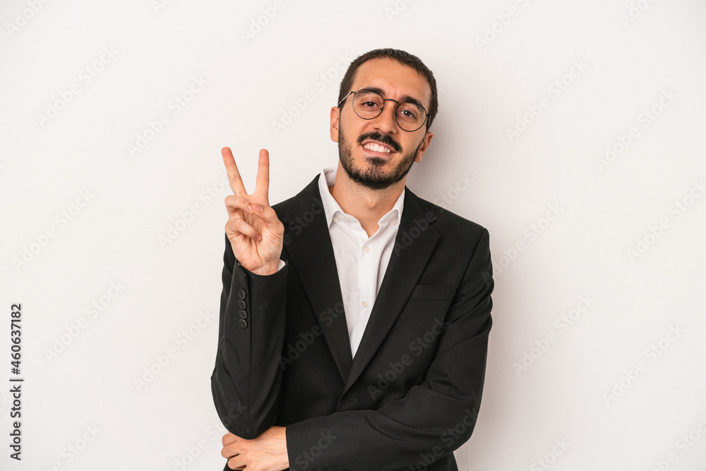 Young caucasian business man isolated on white background showing number two with fingers. Young caucasian business man isolated on white background showing number two with fingers.