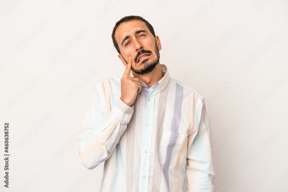 Young caucasian man isolated on white background crying, unhappy with something, agony and confusion concept. Young caucasian man isolated on white background crying, unhappy with something, agony and confusion concept.
