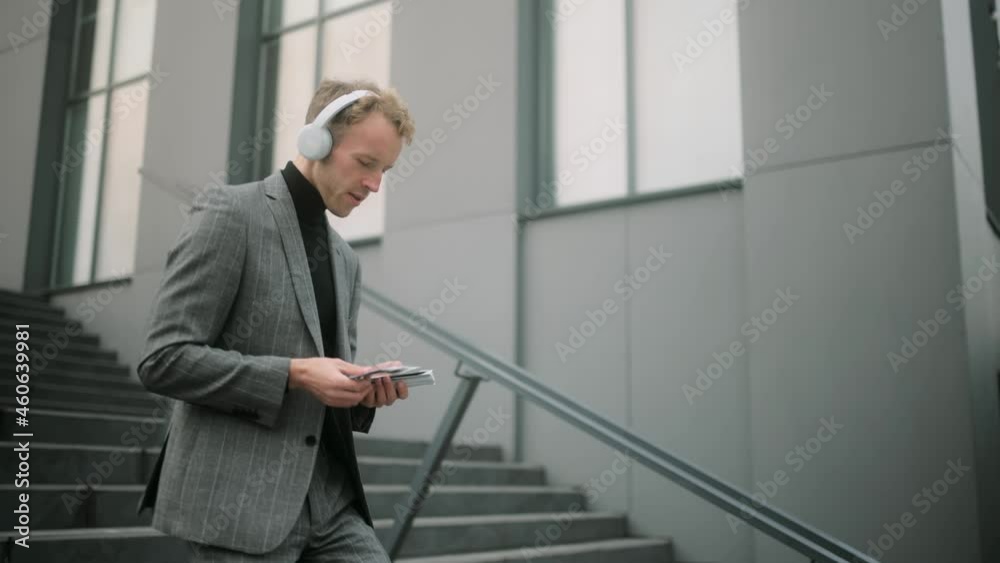 Happy successful young man counting dollar bills. Employee salary. Cash money payment. Successful business concept. High quality 4k footage Happy successful young man counting dollar bills. Employee salary. Cash money payment. Successful business concept. High quality 4k footage