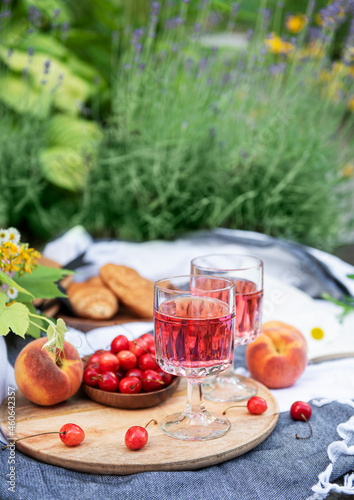 Set for picnic on blanket in lavender field