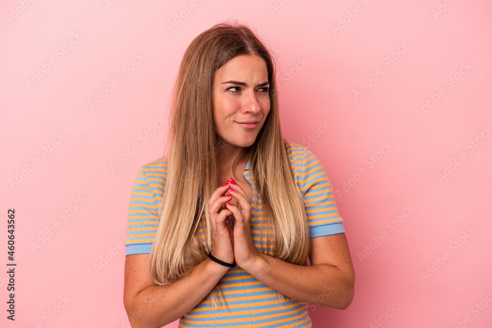 Young Russian woman isolated on pink background smiling confident with crossed arms. Young Russian woman isolated on pink background smiling confident with crossed arms.