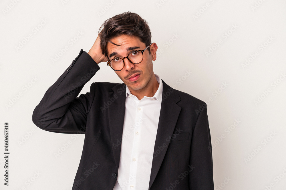 Young mixed race business man isolated on white background being shocked, she has remembered important meeting. Young mixed race business man isolated on white background being shocked, she has remembered important meeting.