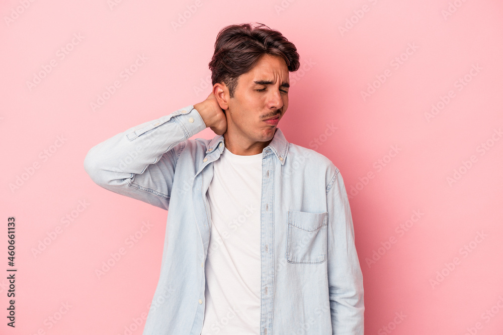 Young mixed race man isolated on white background tired and very sleepy keeping hand on head. Young mixed race man isolated on white background tired and very sleepy keeping hand on head.