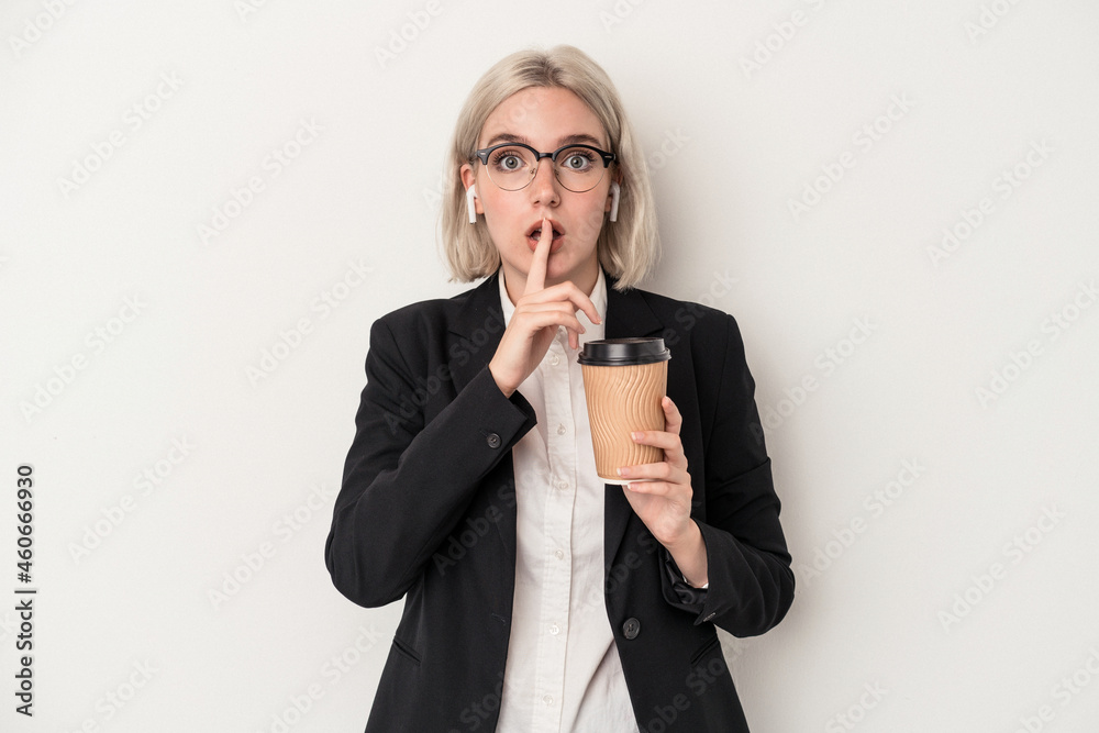 Young caucasian business woman holding take away coffee isolated on white background keeping a secret or asking for silence.