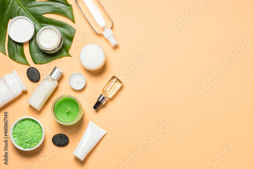 Spa wellness background. Natural spa products and cosmetic at color background. Flat lay image with space for design.