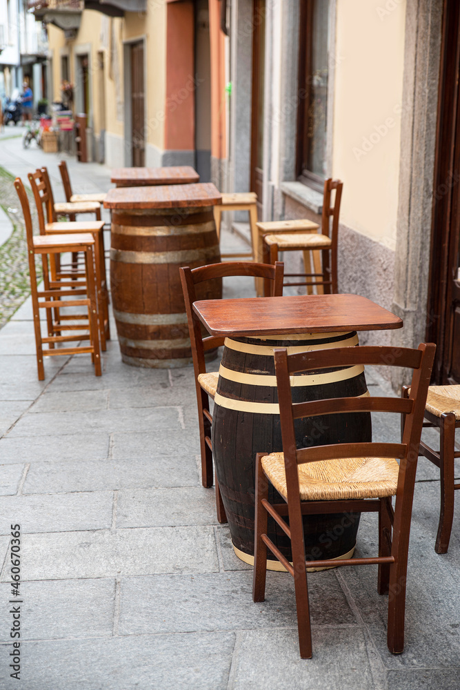 Bar tables and chairs on a street terrace in Italy Bar tables and chairs on a street terrace in Italy