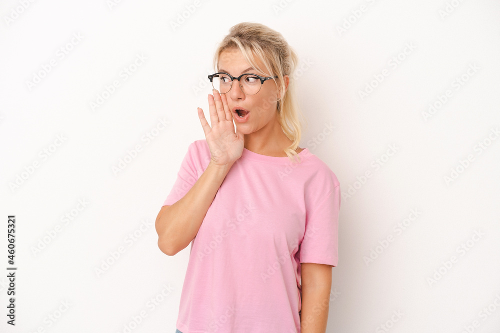 Young Russian woman isolated on white background being shocked because of something she has seen. Young Russian woman isolated on white background being shocked because of something she has seen.