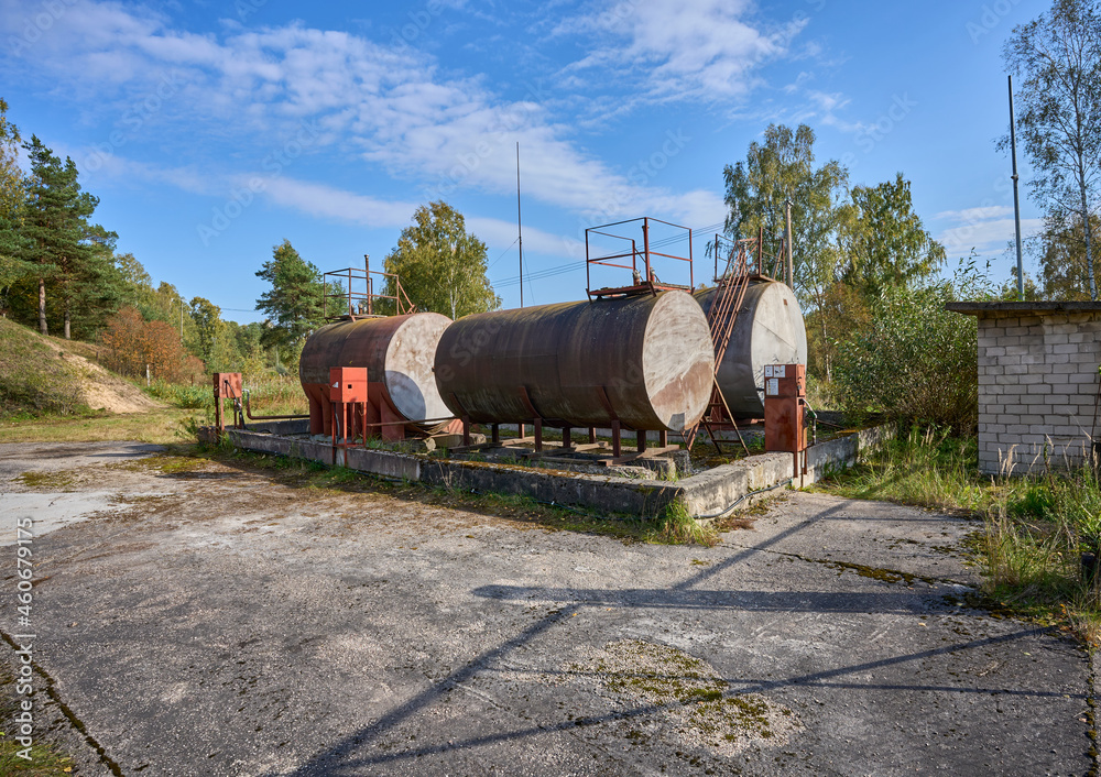 Old rusty abandoned gas station. There is no gasoline.