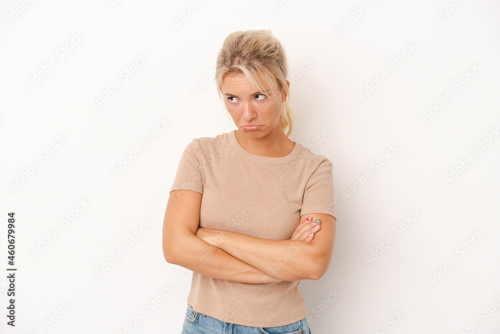 Young Russian woman isolated on white background tired of a repetitive task. Young Russian woman isolated on white background tired of a repetitive task.