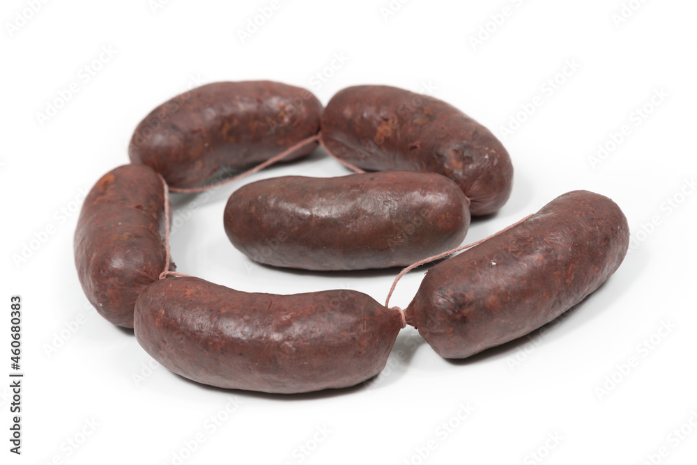 Six crude black pudding sausages on a white background Six crude black pudding sausages on a white background
