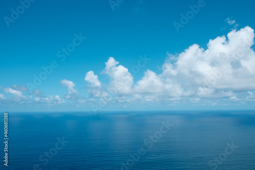 ocean, blue sky and clouds