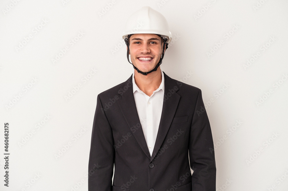 Young architect caucasian man isolated on white background happy, smiling and cheerful. Young architect caucasian man isolated on white background happy, smiling and cheerful.