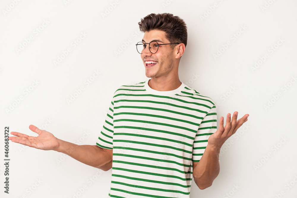 Young caucasian man isolated on white background joyful laughing a lot. Happiness concept. Young caucasian man isolated on white background joyful laughing a lot. Happiness concept.