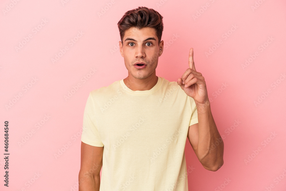Young caucasian man isolated on pink background having an idea, inspiration concept. Young caucasian man isolated on pink background having an idea, inspiration concept.
