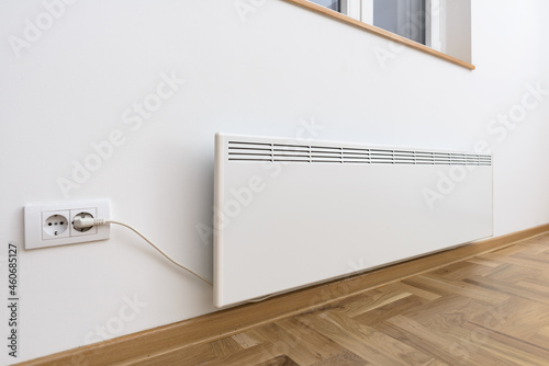 Smart heater convector. Smart Home with the smart heating system. Electric panel heating concept.