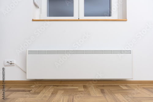 Smart heater convector. Smart Home with the smart heating system. Electric panel heating concept.
