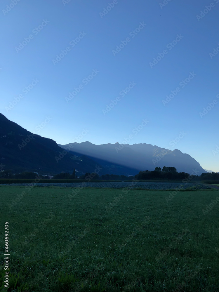 Fototapeta premium SCHAAN, LIECHTENSTEIN, SEPTEMBER 24, 2021 Morning mood in the alps