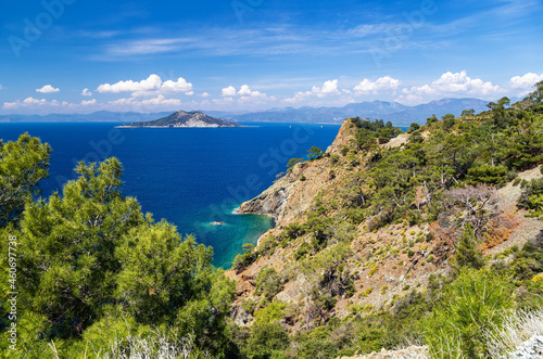 The picturesque landscape of the sea and island from the mountain road. Fethiye, Mugla province, Turkey.