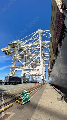 Port, Container Terminal, Port facility. Cranes, Loading, Global transportation. 