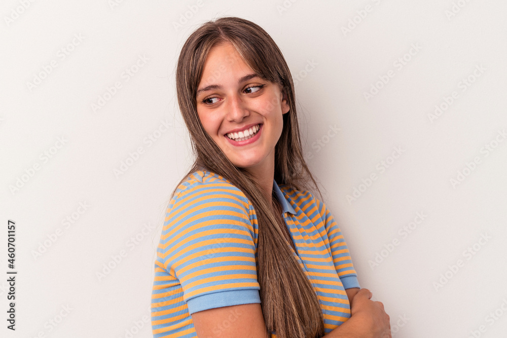 Young caucasian woman isolated on white background laughing and having fun. Young caucasian woman isolated on white background laughing and having fun.