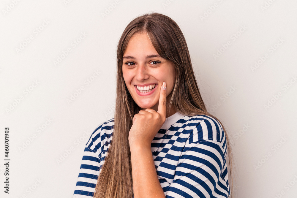 Young caucasian woman isolated on white background smiling happy and confident, touching chin with hand. Young caucasian woman isolated on white background smiling happy and confident, touching chin with hand.