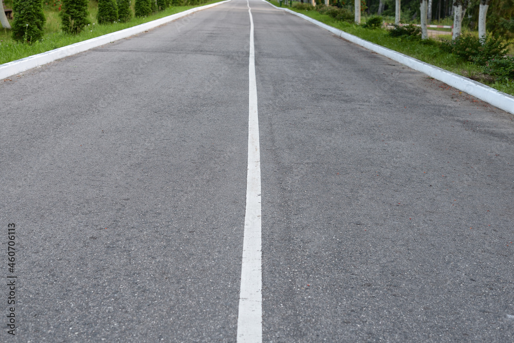 An empty road with a dividing strip
