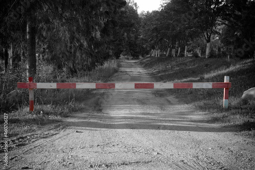 Rural road blocked by a barrier