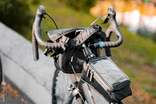 Bicycle bag with transparent zip section for phone mounted on the bike's frame. Road. Transport. Transportation. Commuting