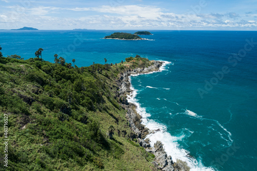 Amazing landscape nature scenery view of Beautiful tropical sea with Sea coast view in summer season image by Aerial view drone top down, high angle view Located at Laem Promthep Phuket Thailand