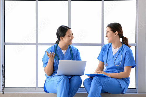 Female Asian doctors with l...