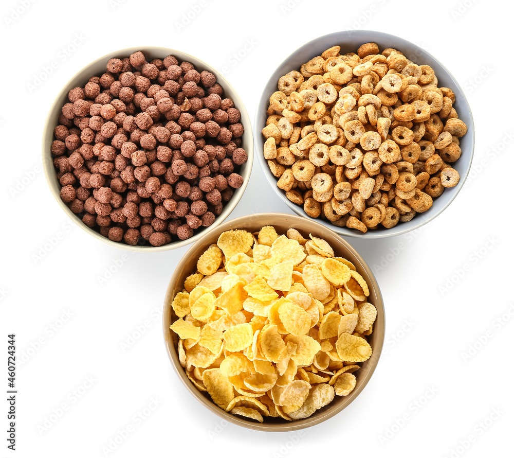 Bowls with cereals on white background Bowls with cereals on white background