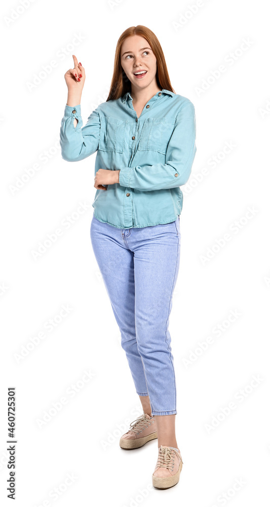 Thoughtful young woman with raised index finger on white background Thoughtful young woman with raised index finger on white background