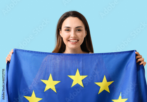 Young woman with flag of Eu...