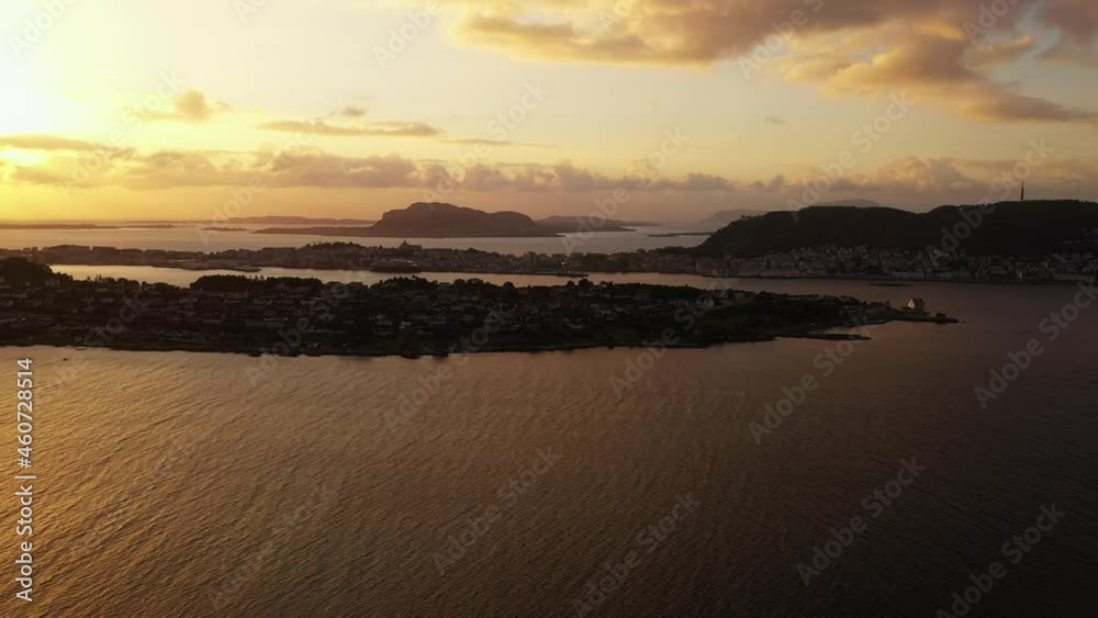 Aerial view of the Alesund city, sunset in More og Romsdal, Norway - trucking, drone shot Aerial view of the Alesund city, sunset in More og Romsdal, Norway - trucking, drone shot